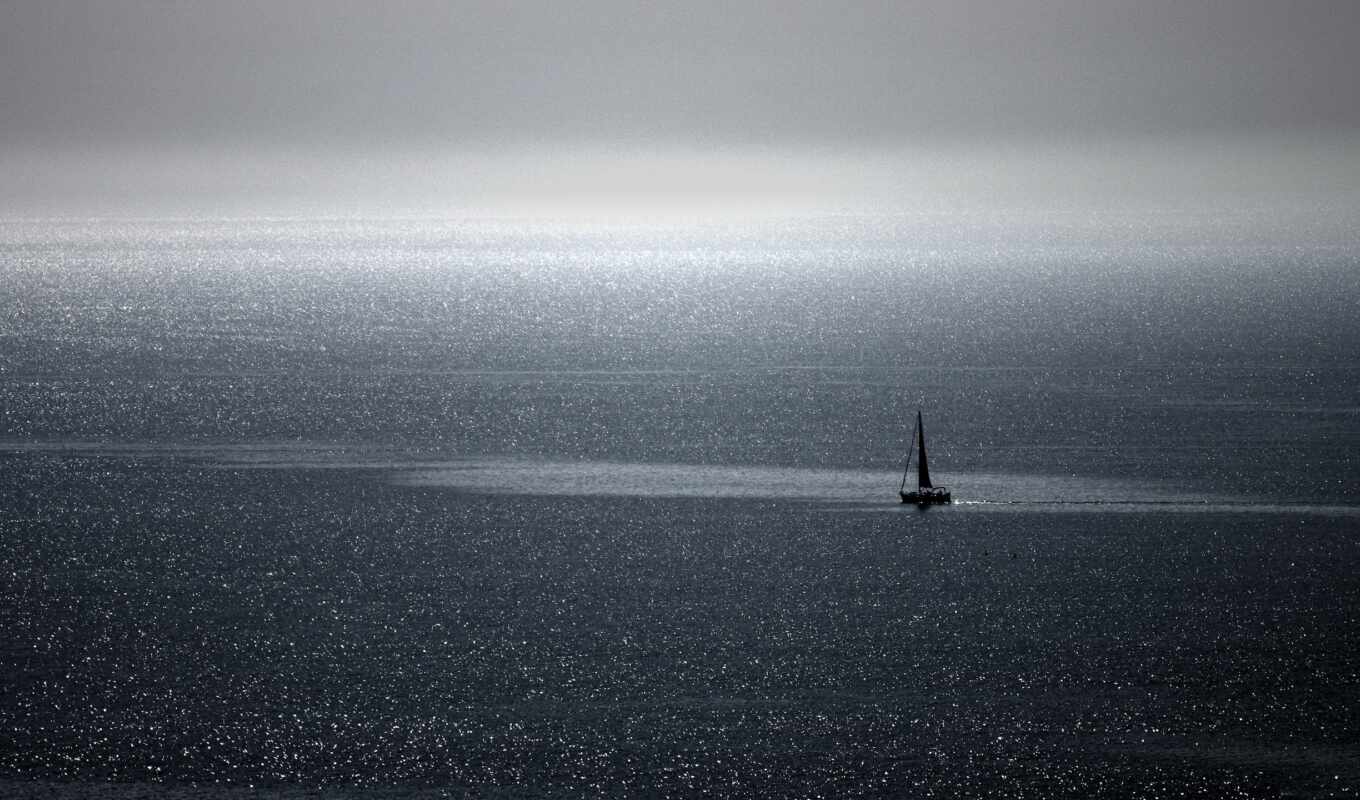ocean, a boat, sail