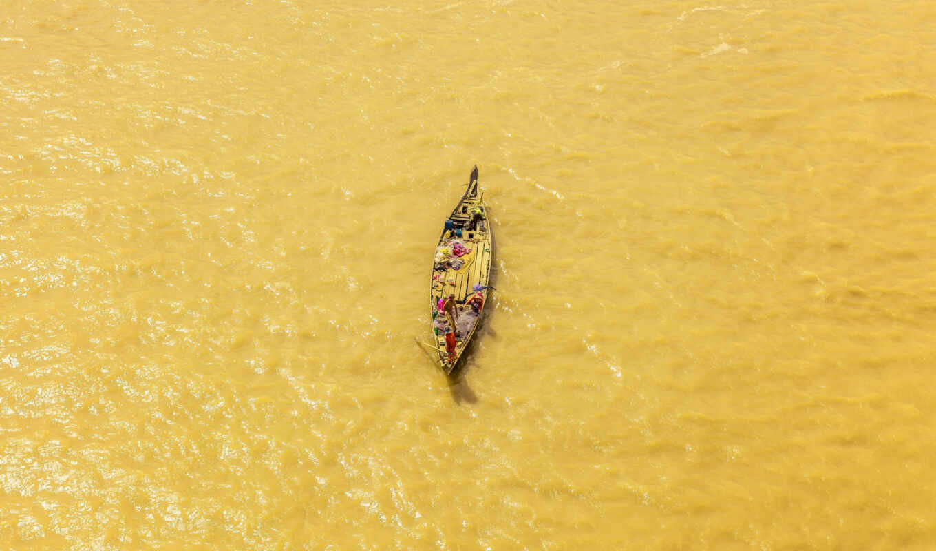 river, a boat, fisherman