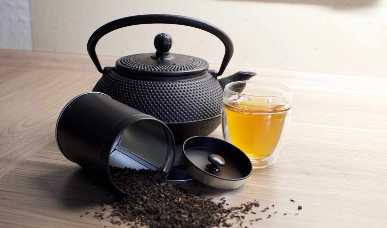 tea, a pen, teapot