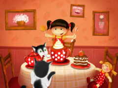 девушка и кошка сидят за столом с тортом и кексом