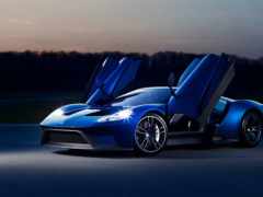 синий спортивный автомобиль с открытыми дверями