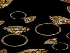 сборник колец и бриллиантов на черном фоне