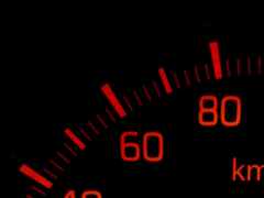 спидометр с красными номерами на нем