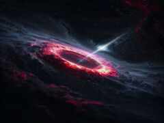 красная и черная галактики со звездой на заднем плане