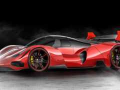 красный спортивный автомобиль с красной крышей и красными колесами