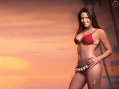 женщина в красном бикини позирует для фото