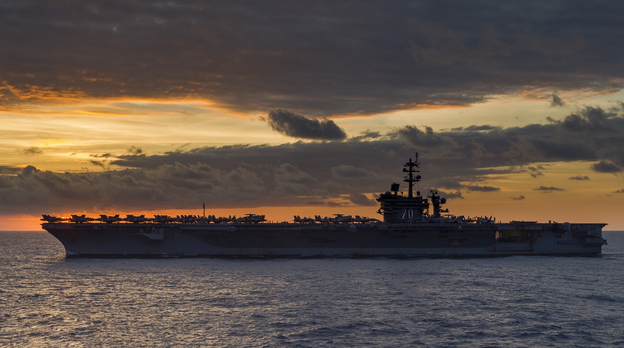 Colorful cvn. Военный корабль рассвет. Военный корабль на закате. Авианосец на закате. Авианосец на фоне заката.