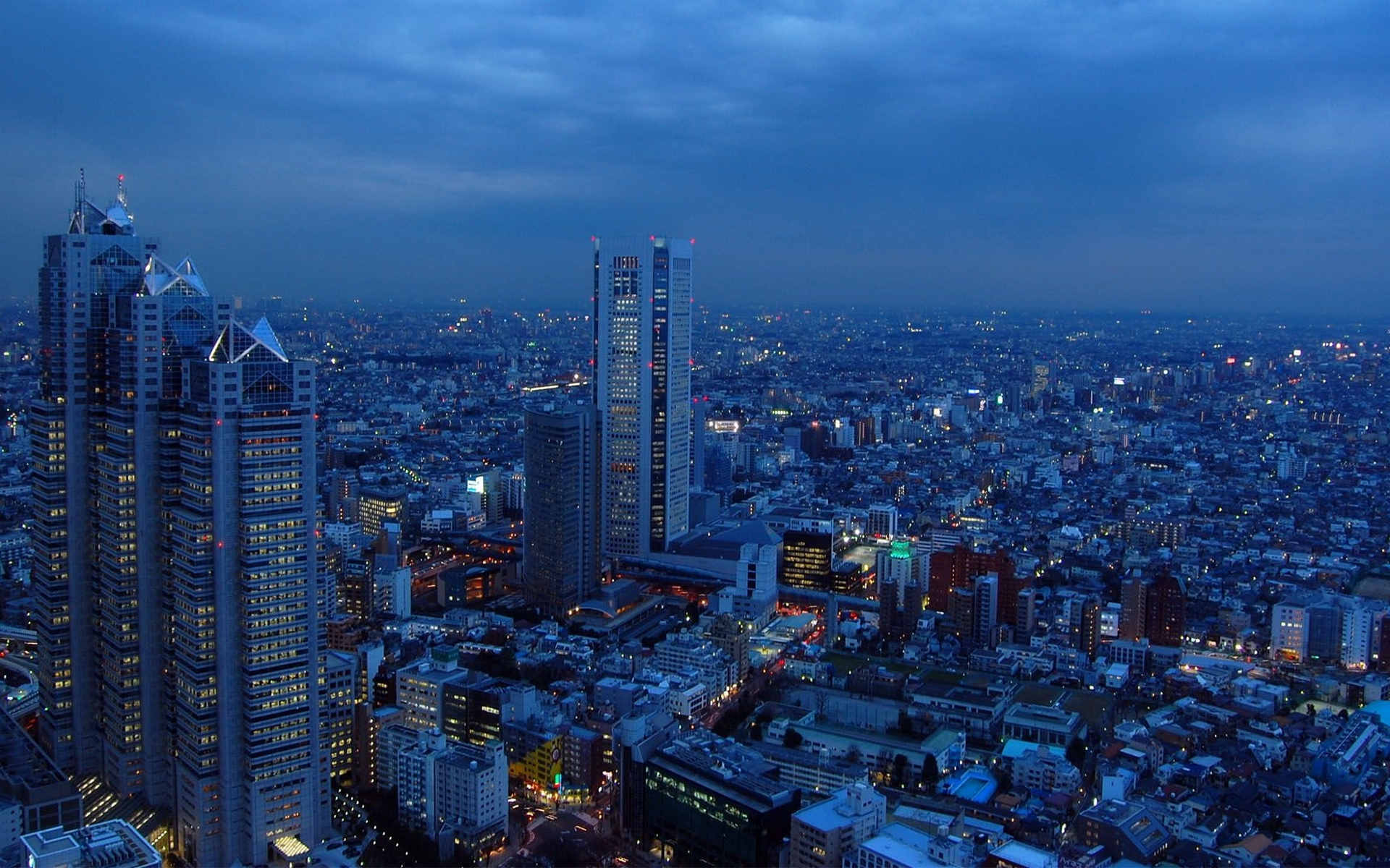 Обои tokyo. Префектура Токио небоскребы. Япония небоскребы Токио. Япония Мегаполис Токио ночью. Япония Токио ночью небоскребы.