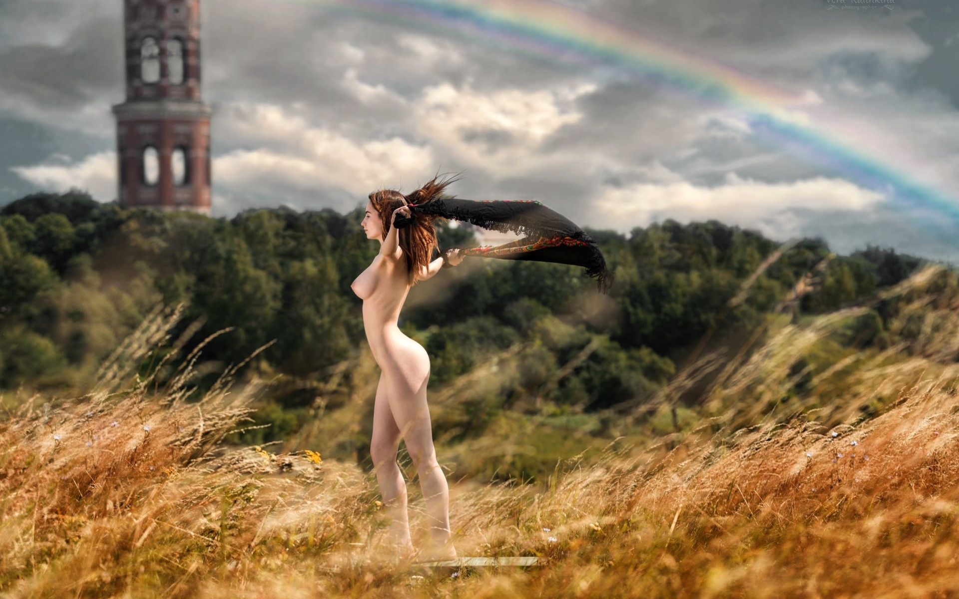 Sparkling shiny rainbow naked body of girl stock photo