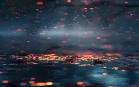 закрытие размытой фотографии темно-синего фона с оранжевыми огнями